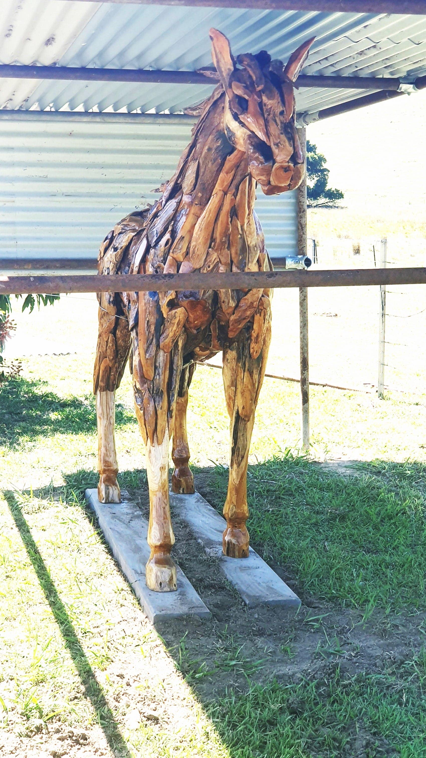 Taka-Tu-Tu, a wooden horse sculpture built from over 1,000 pieces of teak, at Elm Cottage